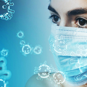 A medical professional wearing a face mask. Virus images also present. This is to represent the health industry,